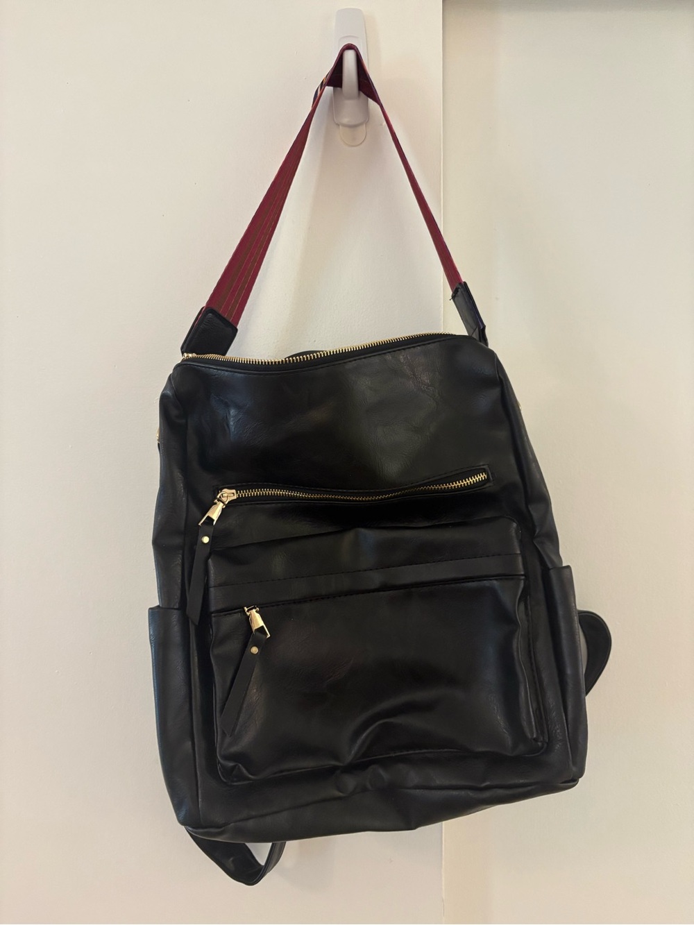 Black Leather Backpack with Red Strap